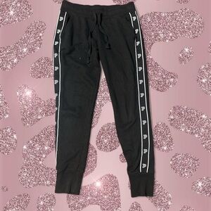 PINK Victoria's Secret Black Sweatpants with white accents on the sides of it